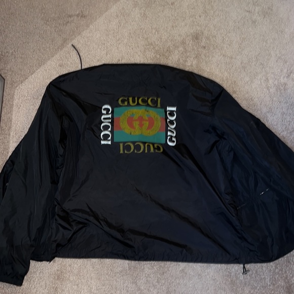 Authentic Gucci windbreaker jacket. No issues lightly worn.